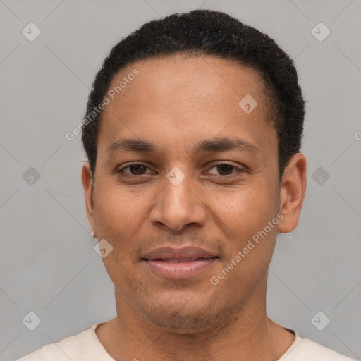 Joyful latino young-adult male with short  brown hair and brown eyes