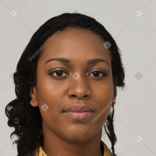 Joyful black young-adult female with long  black hair and brown eyes