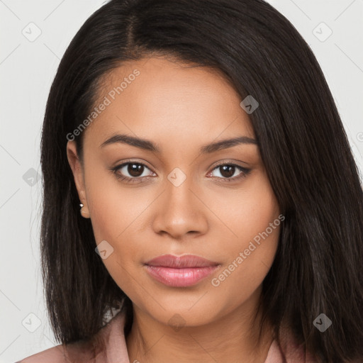 Joyful latino young-adult female with long  brown hair and brown eyes