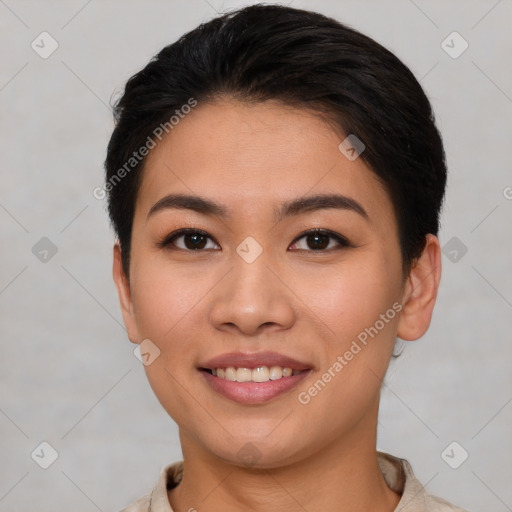 Joyful asian young-adult female with short  brown hair and brown eyes