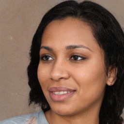 Joyful latino young-adult female with medium  black hair and brown eyes