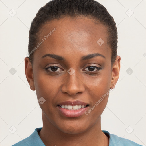 Joyful black young-adult female with short  brown hair and brown eyes