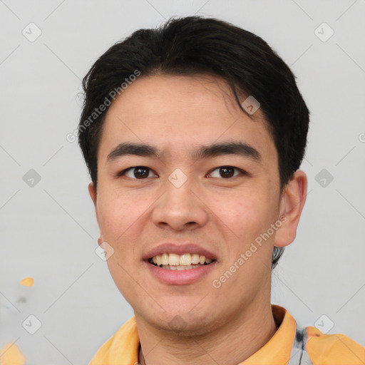 Joyful white young-adult male with short  black hair and brown eyes