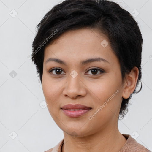 Joyful latino young-adult female with short  brown hair and brown eyes