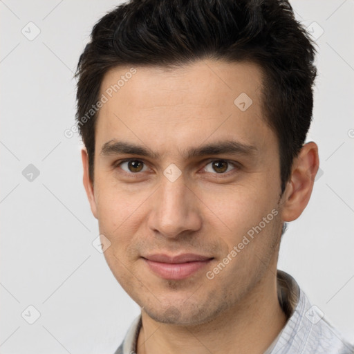 Joyful white young-adult male with short  brown hair and brown eyes