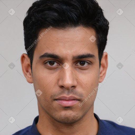 Neutral latino young-adult male with short  black hair and brown eyes