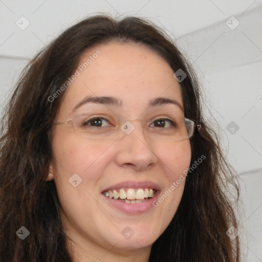 Joyful white adult female with long  brown hair and brown eyes