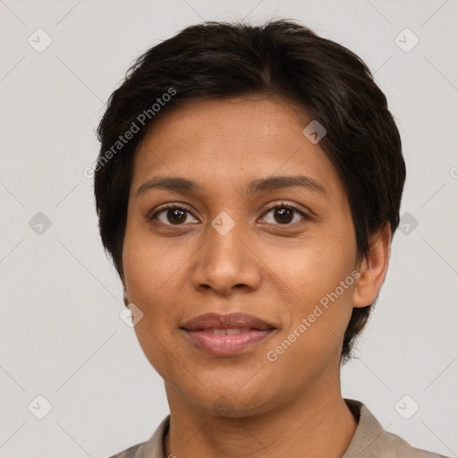 Joyful latino young-adult female with short  brown hair and brown eyes