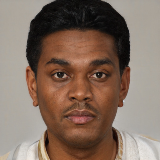 Neutral black young-adult male with short  black hair and brown eyes
