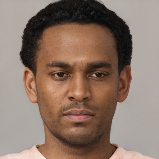 Neutral black young-adult male with short  brown hair and brown eyes