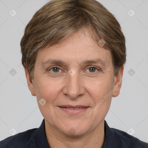 Joyful white adult female with short  brown hair and brown eyes