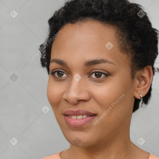 Joyful latino young-adult female with short  brown hair and brown eyes