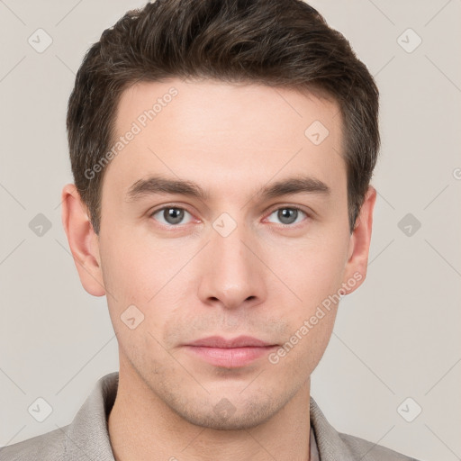 Neutral white young-adult male with short  brown hair and grey eyes