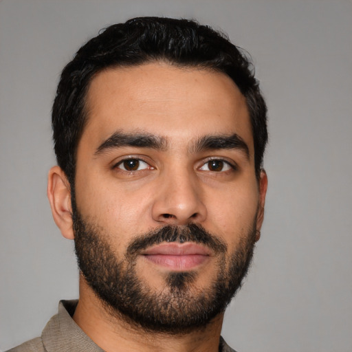 Neutral latino young-adult male with short  black hair and brown eyes