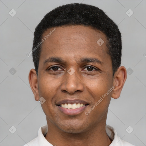 Joyful latino adult male with short  black hair and brown eyes