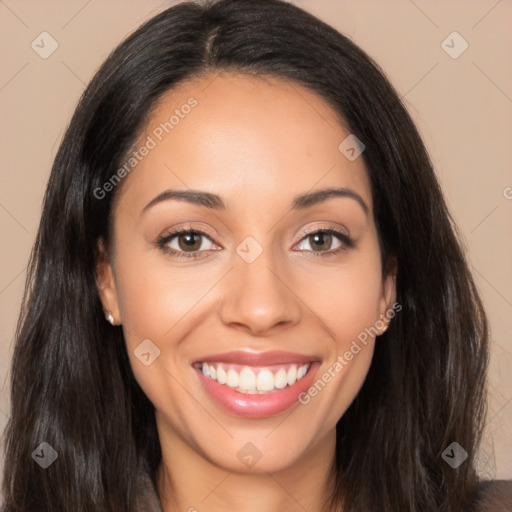 Joyful latino young-adult female with long  brown hair and brown eyes