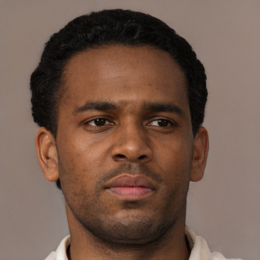 Neutral black young-adult male with short  brown hair and brown eyes