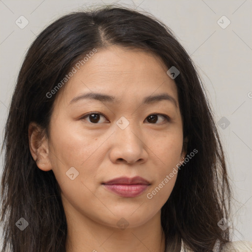 Joyful asian young-adult female with long  brown hair and brown eyes