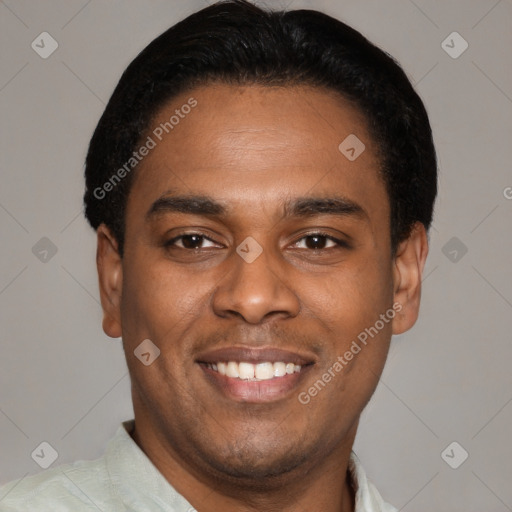 Joyful latino young-adult male with short  black hair and brown eyes