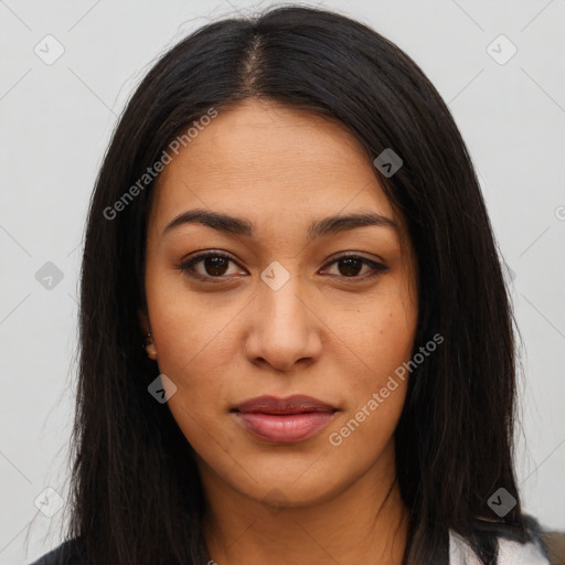 Joyful latino young-adult female with long  brown hair and brown eyes