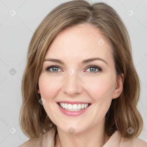 Joyful white young-adult female with medium  brown hair and green eyes