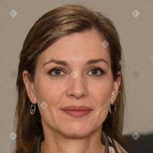 Joyful white adult female with medium  brown hair and grey eyes