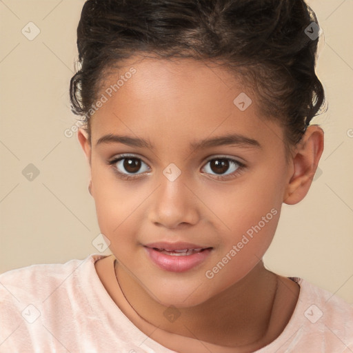 Joyful white child female with short  brown hair and brown eyes