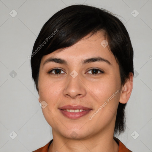 Joyful white young-adult female with medium  black hair and brown eyes