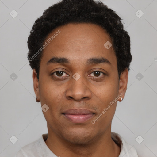 Joyful black young-adult male with short  brown hair and brown eyes