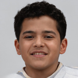 Joyful white child male with short  brown hair and brown eyes