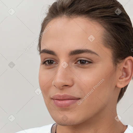 Joyful white young-adult female with short  brown hair and brown eyes