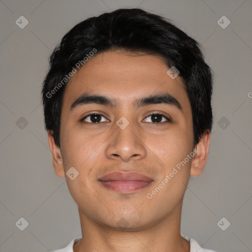 Joyful latino young-adult male with short  black hair and brown eyes