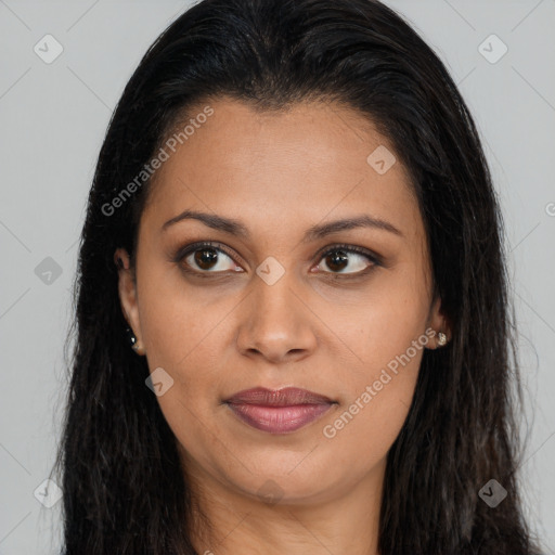 Joyful latino young-adult female with long  brown hair and brown eyes