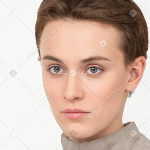 Neutral white young-adult female with short  brown hair and brown eyes