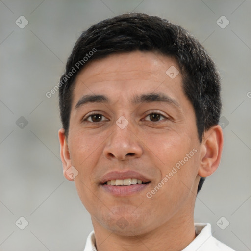 Joyful white adult male with short  brown hair and brown eyes