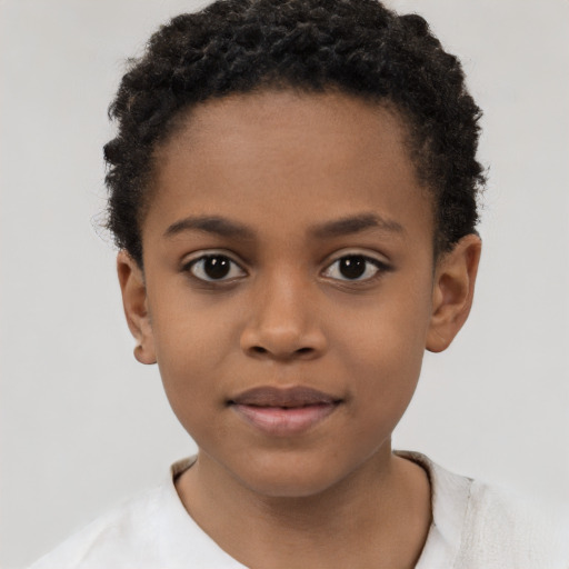 Joyful black child female with short  brown hair and brown eyes