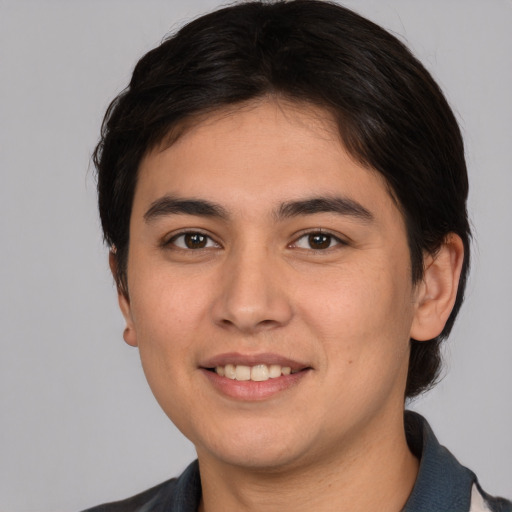 Joyful white young-adult male with medium  brown hair and brown eyes