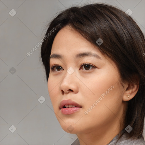 Neutral white young-adult female with medium  brown hair and brown eyes