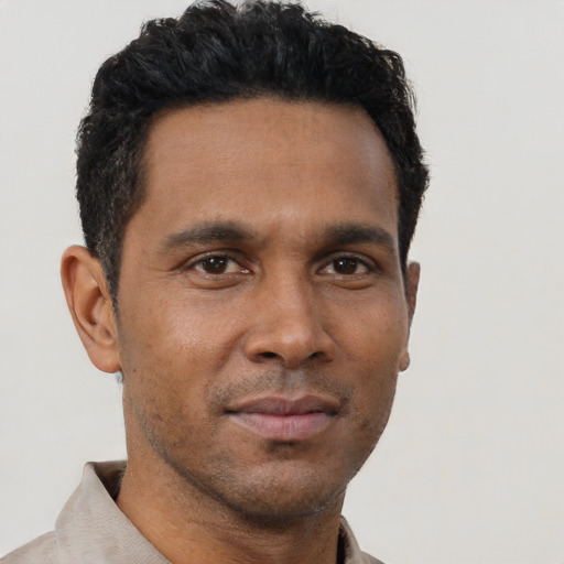 Neutral black young-adult male with short  brown hair and brown eyes