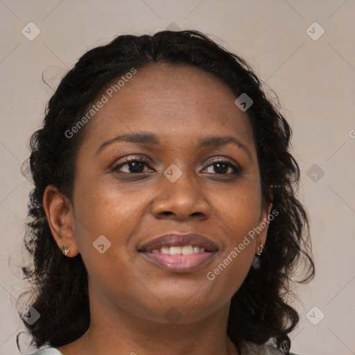 Joyful black young-adult female with medium  brown hair and brown eyes