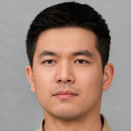 Neutral asian young-adult male with short  black hair and brown eyes