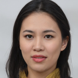 Joyful asian young-adult female with long  brown hair and brown eyes