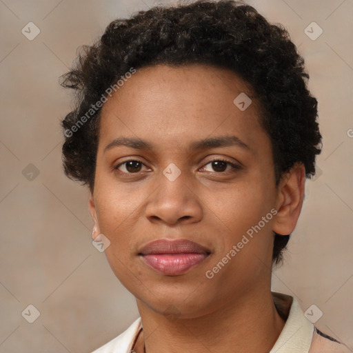 Joyful black young-adult female with short  brown hair and brown eyes