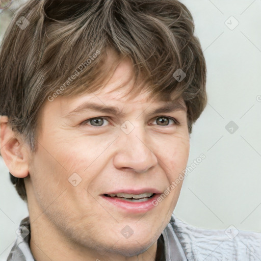 Joyful white adult male with short  brown hair and grey eyes