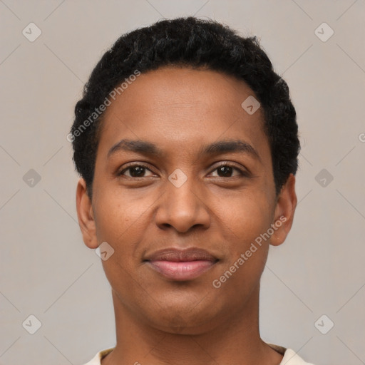 Joyful black young-adult male with short  black hair and brown eyes