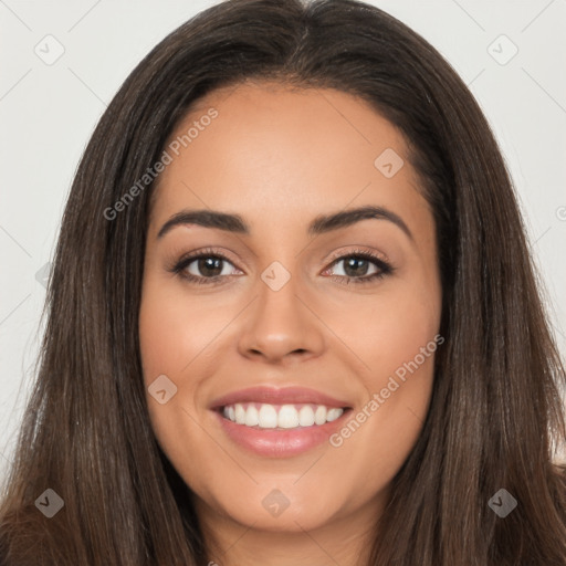 Joyful white young-adult female with long  brown hair and brown eyes