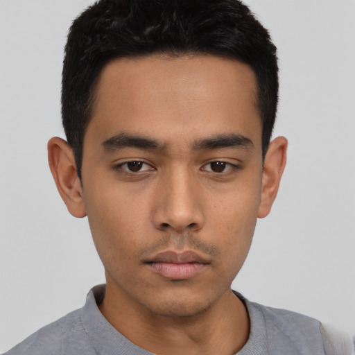 Neutral asian young-adult male with short  black hair and brown eyes
