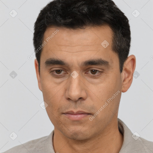 Neutral latino young-adult male with short  black hair and brown eyes