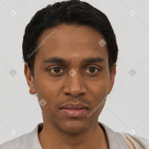 Neutral black young-adult male with short  black hair and brown eyes