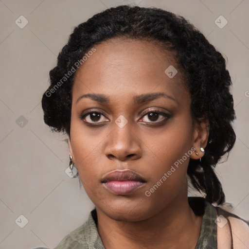 Neutral black young-adult female with medium  black hair and brown eyes